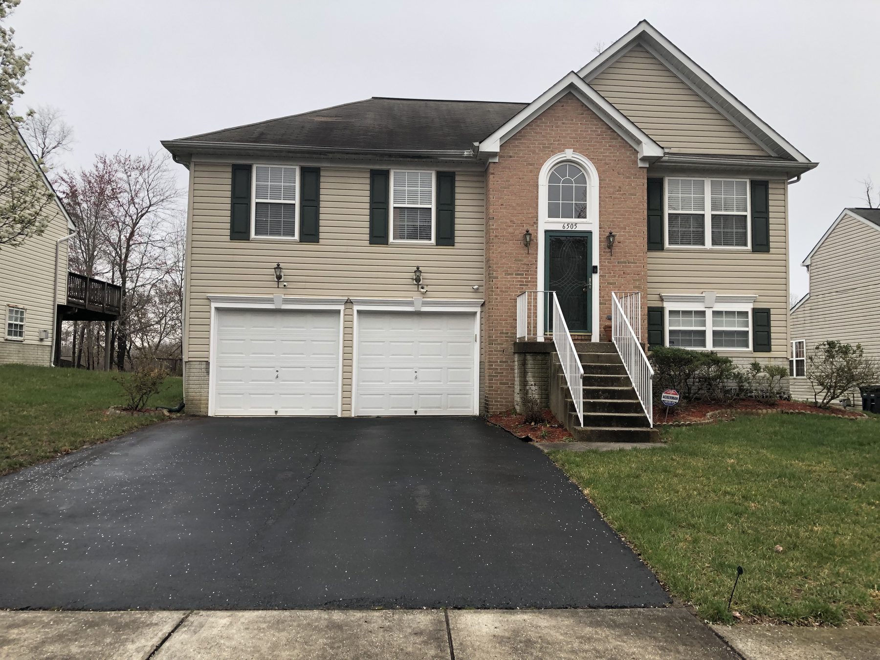 A two-story suburban Maryland home with a two-car garage