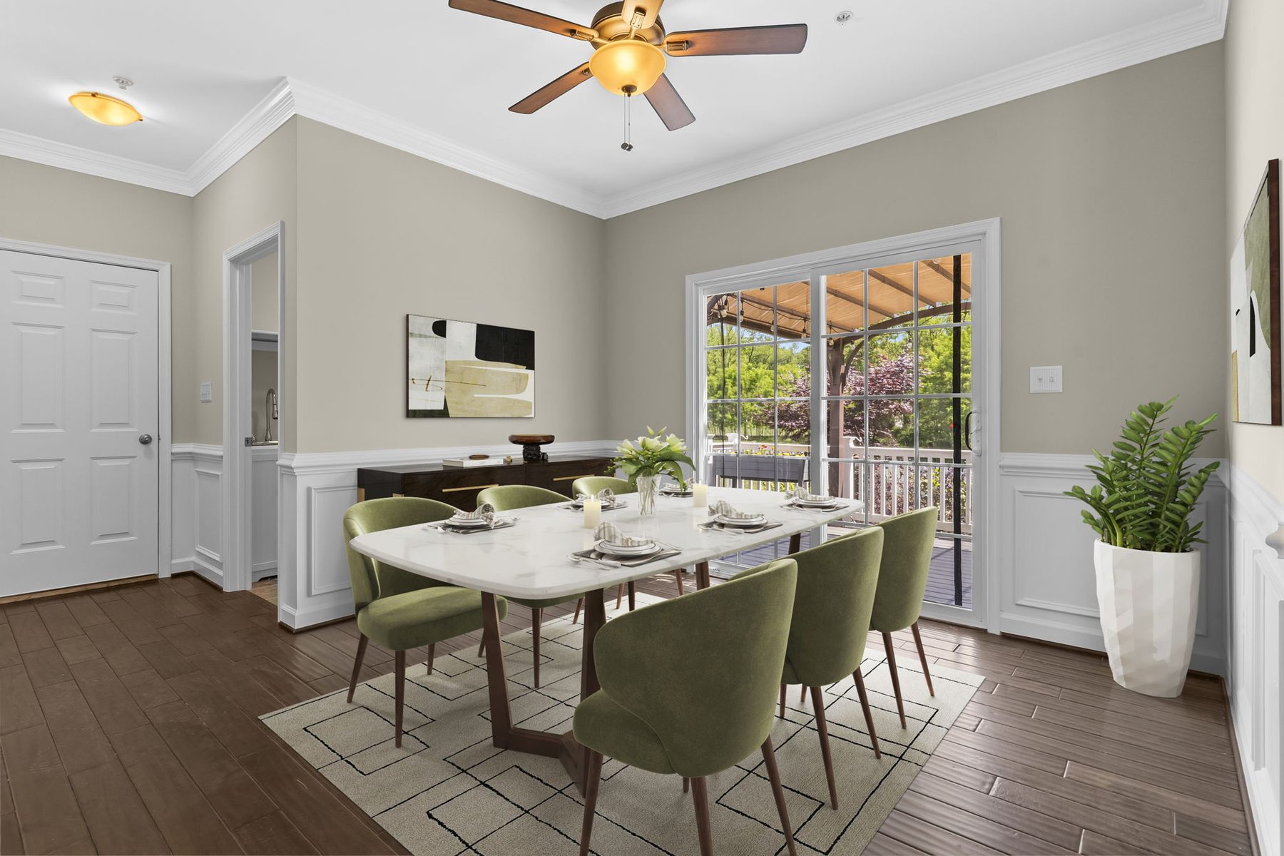 A bright dining room, virtually staged